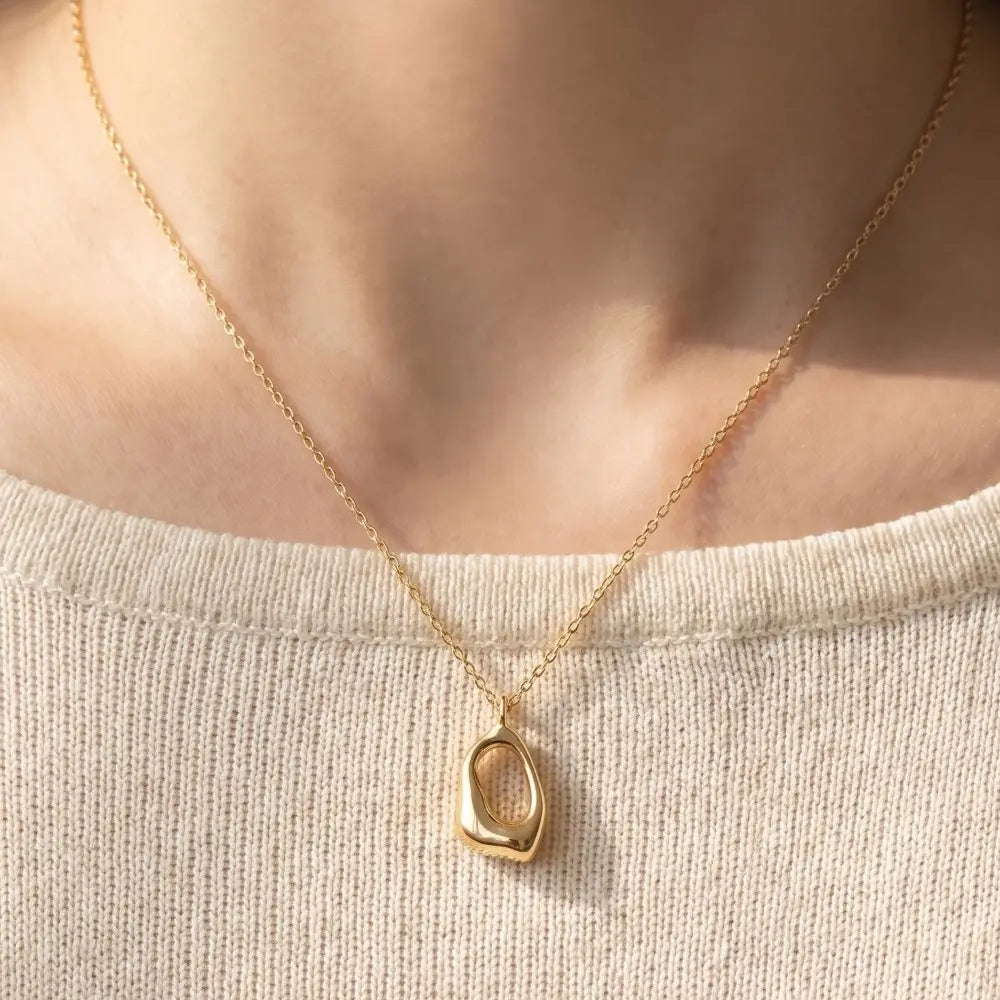 Open-Form Gold Pendant Necklace