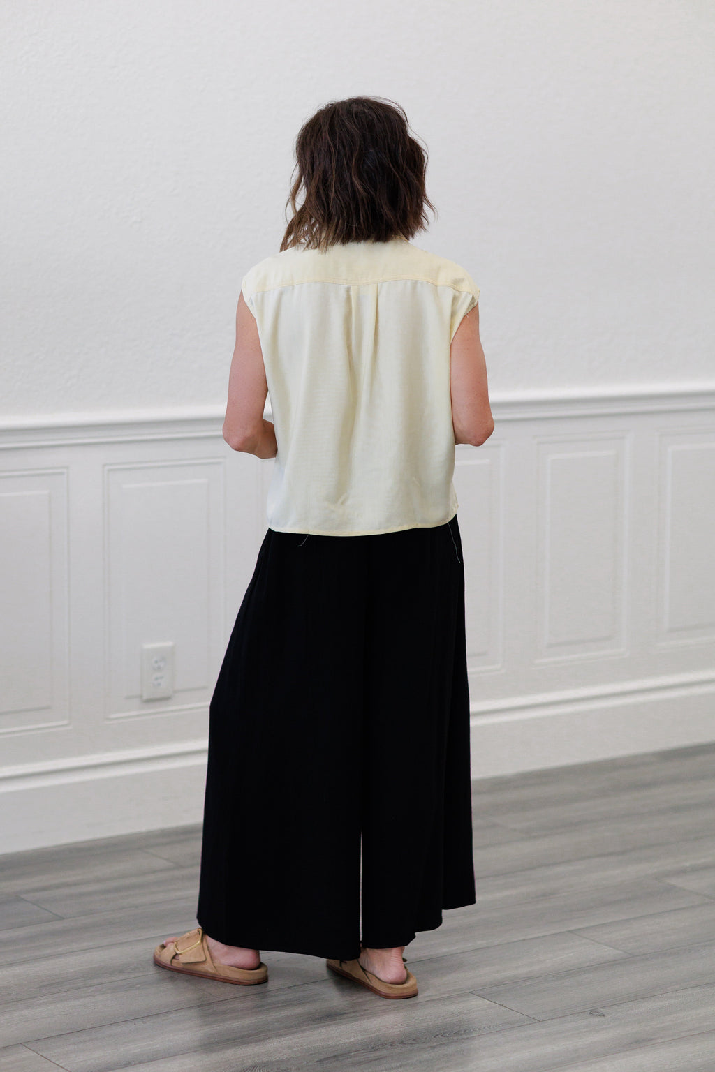 Wide Shoulder Twisted Hem Shirt in Butter Yellow